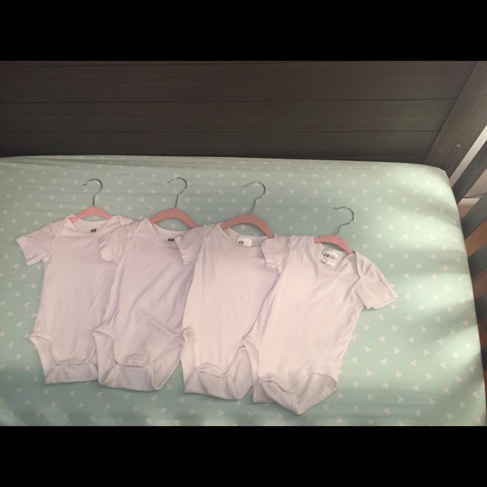 Bundle of 4 white short sleeve onesies